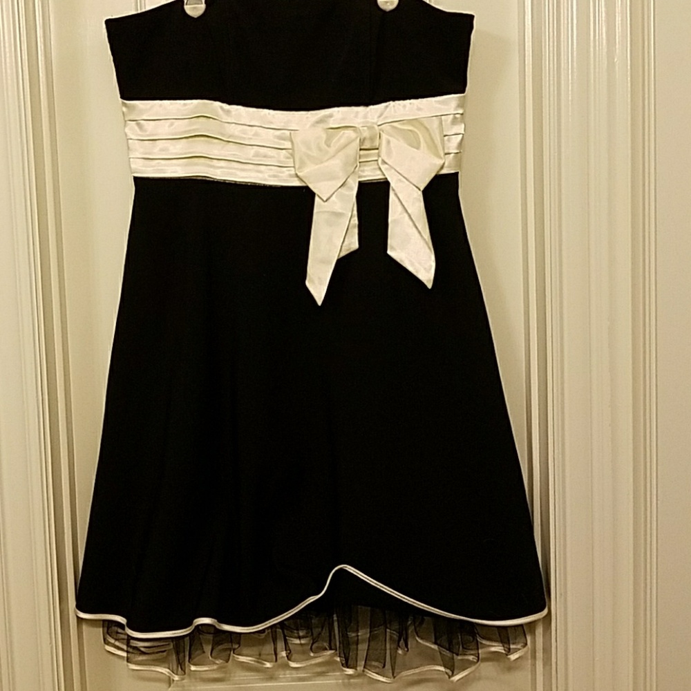 Strapless black formal dress with cream sash